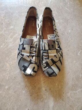 Toms Black and White Logo Canvas Slip-On Flats